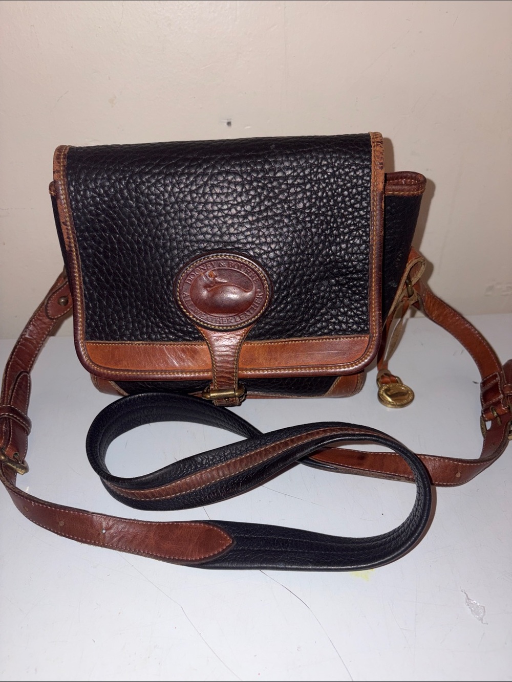 Dooney & Bourke Black Pebble Leather crossbody Messenger with Brown Trim - Picture 1 of 9
